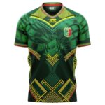 Green athletic jersey with gold geometric patterns, red trim, and a shield emblem on the left chest.