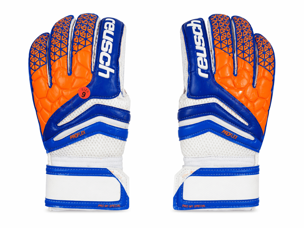 Pair of blue and orange goalkeeper gloves with white mesh palms, showing brand name ‘uhlsport’ and white/blue Velcro cuffs.