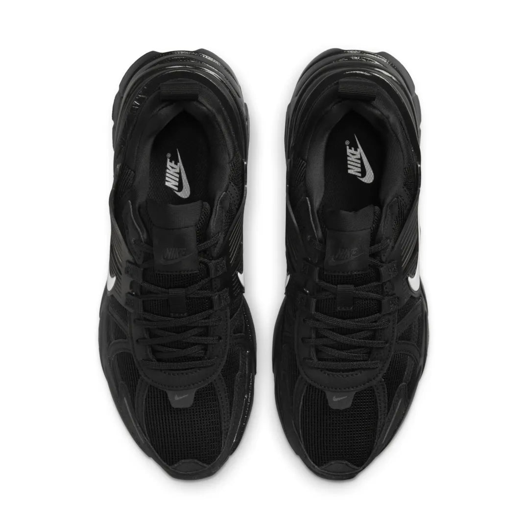 rn-image_picker_lib_temp_e33e1348-352f-427e-a2a5-c1c25b21b7b9 | UAE SPORT STORE Pair of black Nike sneakers viewed from above, laces tied, white Nike swooshes visible on sides