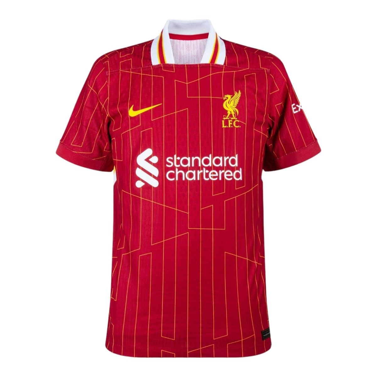Red Liverpool FC football jersey with yellow crest, Nike swoosh and Standard Chartered sponsor on the chest.