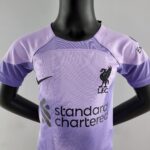 rn-image_picker_lib_temp_f3ec45cb-dfa9-42e0-b97d-98a76fde772c | UAE SPORT STORE Front view of a lavender T-shirt on a black mannequin displaying the Standard Chartered branding on the chest.
