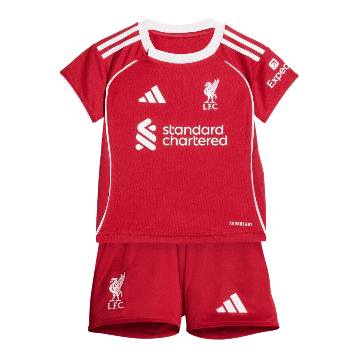 Red Liverpool FC soccer jersey with white trim, Adidas logo, LFC crest, and Standard Chartered sponsor; red shorts with LFC crest.