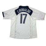 Back view of a white jersey with dark shoulder panels reading 'C. RONALDO' and the number 17 in dark, athletic style.