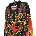 s-l1600_1_b0f1a039-fc8a-4b01-8d77-3a133dae2490 | UAE SPORT STORE Flame-patterned black jersey with red–yellow flames, Asics logo, and JFA crest for Japan 1998 World Cup.