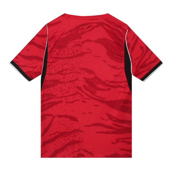 Red athletic jersey seen from the back, with black side panels and black-trimmed short sleeves.