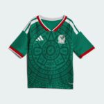 Mexico national team green jersey with red and white trim, Adidas logo, and crest featuring an eagle on the chest