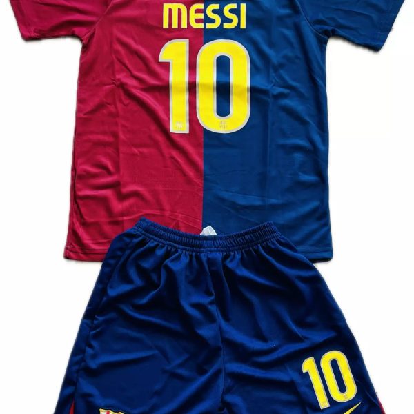 FC Barcelona home kit: red and blue split jersey with 'MESSI' and large '10' on back, paired with blue shorts bearing the number 10 and club crest