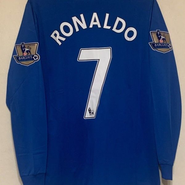 Blue Manchester United jersey with 'RONALDO' and number 7 on the back, featuring Barclays Premier League patches on the sleeves.