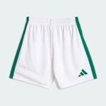 White athletic shorts with green side piping and an elastic waistband; small green logo near the bottom right leg.