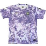Purple camouflage sports jersey with lime trim, Korean emblem on chest and Nike swoosh on the front.