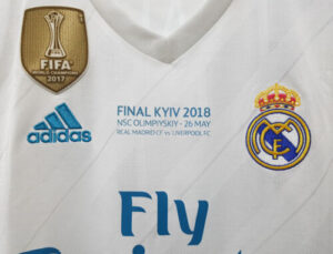 s-l500_13_c9fca60b-6871-4934-8313-15abd078e7e6 | UAE SPORT STORE White Real Madrid football jersey featuring the FIFA World Champions 2017 badge, Adidas logo, Real Madrid crest, and Fly Emirates sponsor.