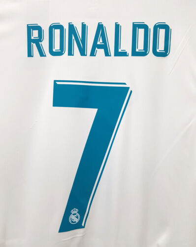 s-l500_18_89e66876-476f-4fac-b6a5-49ab03b976a2 | UAE SPORT STORE Back view of a white Real Madrid jersey displaying the name Ronaldo and the blue number 7.