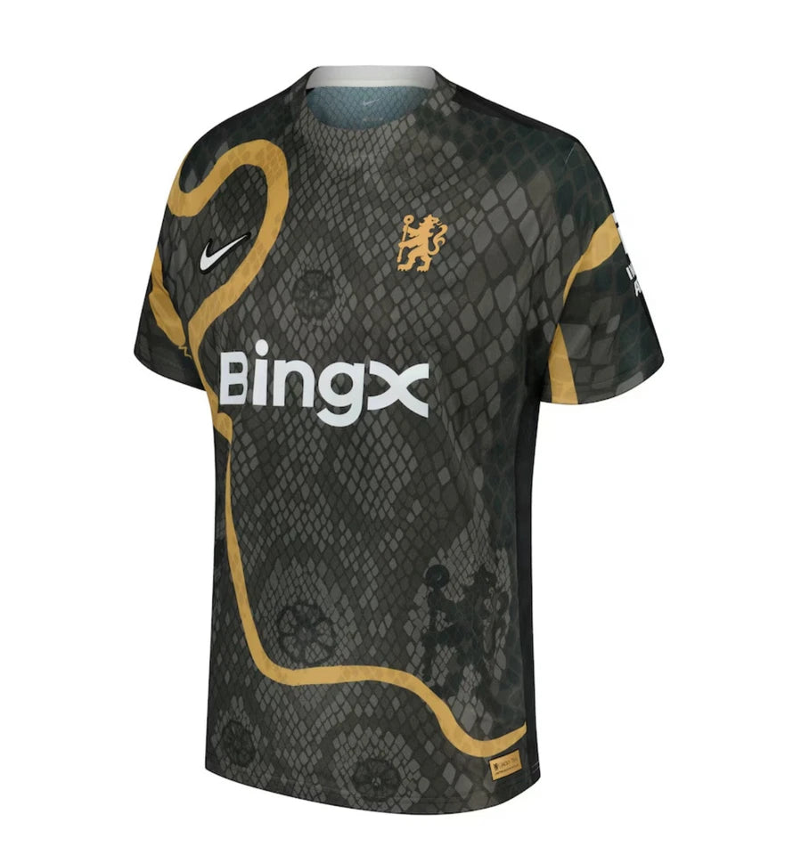 s-l960_13 | UAE SPORT STORE Black snake-pattern sports jersey with gold piping and sponsor text 'BingX'; features a small gold lion crest and Nike swoosh on chest. Note: decorative design and sponsor branding are highlighted, not the exact team details.
