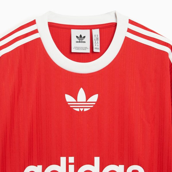 Red Adidas jersey with white collar, white stripes on the sleeves, and the white trefoil logo visible on the chest area.