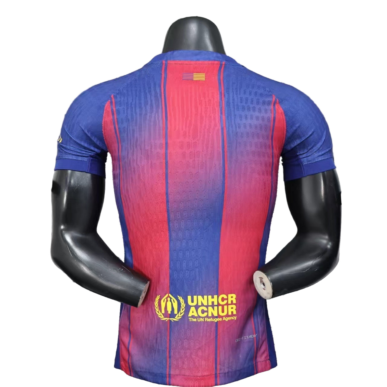 vt | UAE SPORT STORE Back view of a blue-to-pink gradient cycling jersey with UNHCR logo on the lower back and a small flag on the neck area.