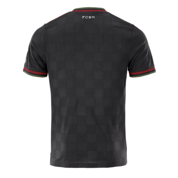 Back view of a black checkered football/soccer jersey with red trim at sleeves and neck, FCBM text at the collar.