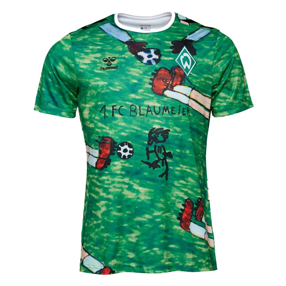 werder-bremen-2024_green_special-edition_1 Green soccer jersey featuring cartoon drawings, a white collar, Hummel logo, and a team crest on the chest.