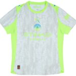 Manchester City football jersey in gray with neon lime panels and water-drop pattern, featuring the club crest and Puma logos on the chest and sleeves and Etihad Airways text partially visible.