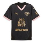 Black sports jersey with pink V-neck and pink sleeve cuffs, subtle geometric pattern, gold logo of a bird on the chest, and the words 'OLD WILD WEST' in gold across the front.