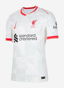 White Liverpool FC away jersey with red crest, Nike swoosh, and Standard Chartered sponsor logo on front.