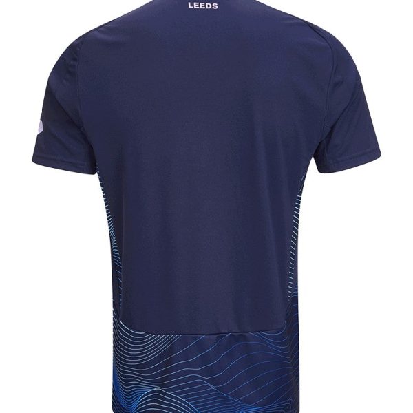 Back view of a navy blue sports jersey with the word 'LEEDS' near the neck and light blue wave pattern along the hem area.