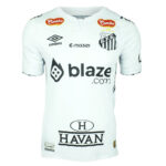 yPmIzU0Gxco8kL4 | UAE SPORT STORE White soccer jersey with sponsor logos (blaze.com center, HAVAN bottom) and crest on the chest; plain white with short sleeves.