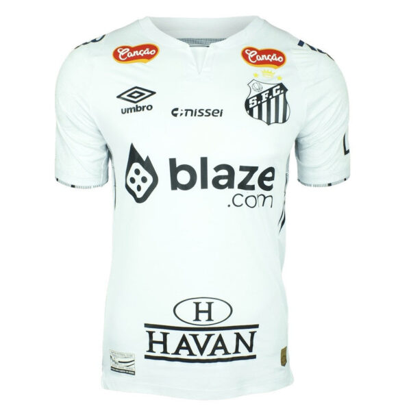 White soccer jersey with sponsor logos (blaze.com center, HAVAN bottom) and crest on the chest; plain white with short sleeves.