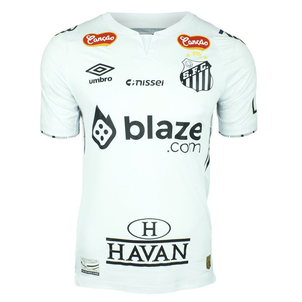 yPmIzU0Gxco8kL4 | UAE SPORT STORE White soccer jersey with sponsor logos (blaze.com center, HAVAN bottom) and crest on the chest; plain white with short sleeves.