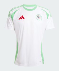 White soccer jersey with green accents, red Adidas logo, and circular crest on the chest showing a soccer ball motif.