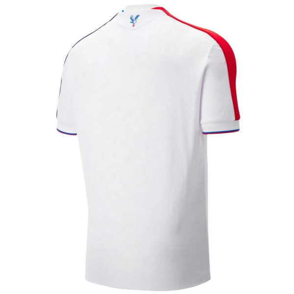 White polo shirt shown from the back with red shoulder panel and blue/red trim on the sleeves and collar detail