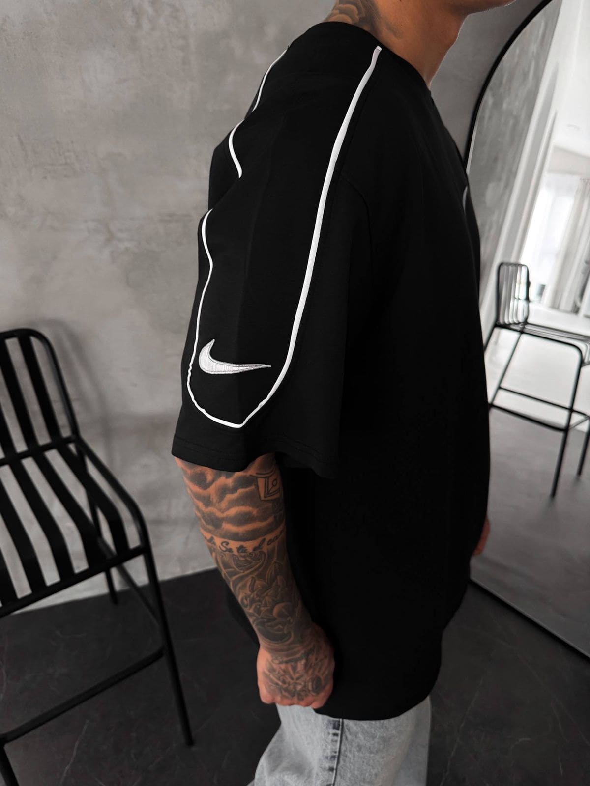 03eb2b1f-c7ba-49ea-ba38-b970306b9dc2 | UAE SPORT STORE Men’s Oversized Black T-Shirt with White Piping