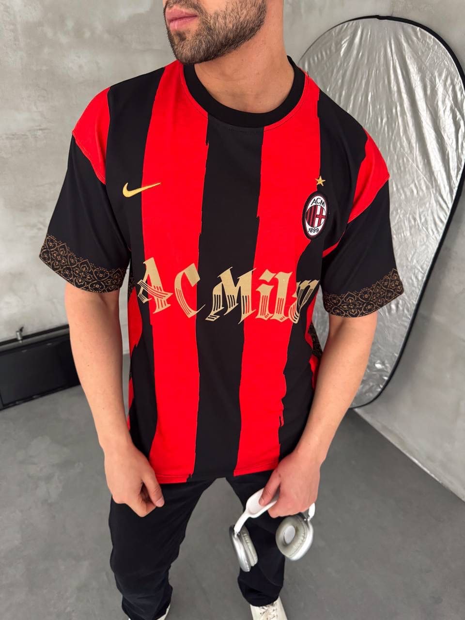 0ea97e3e-05fc-44bc-8e3f-1496c49834ef | UAE SPORT STORE Milan Inspired 80 Oversized Striped Jersey Tee Red Black Gold