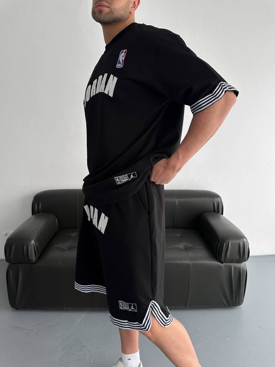 1ae4a925-c603-4622-b731-ebfb8c5720ac | UAE SPORT STORE Black Basketball Jersey Tee and Shorts Set – White Stripe Trim