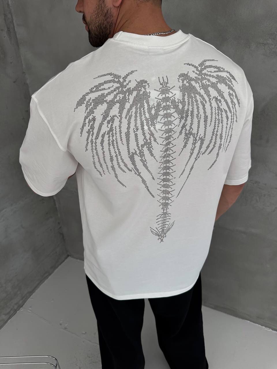 3db56b28-ad4a-46f5-be64-11c2b2ad80e1 | UAE SPORT STORE Men’s White Oversized Dark Angel Rhinestone T-Shirt