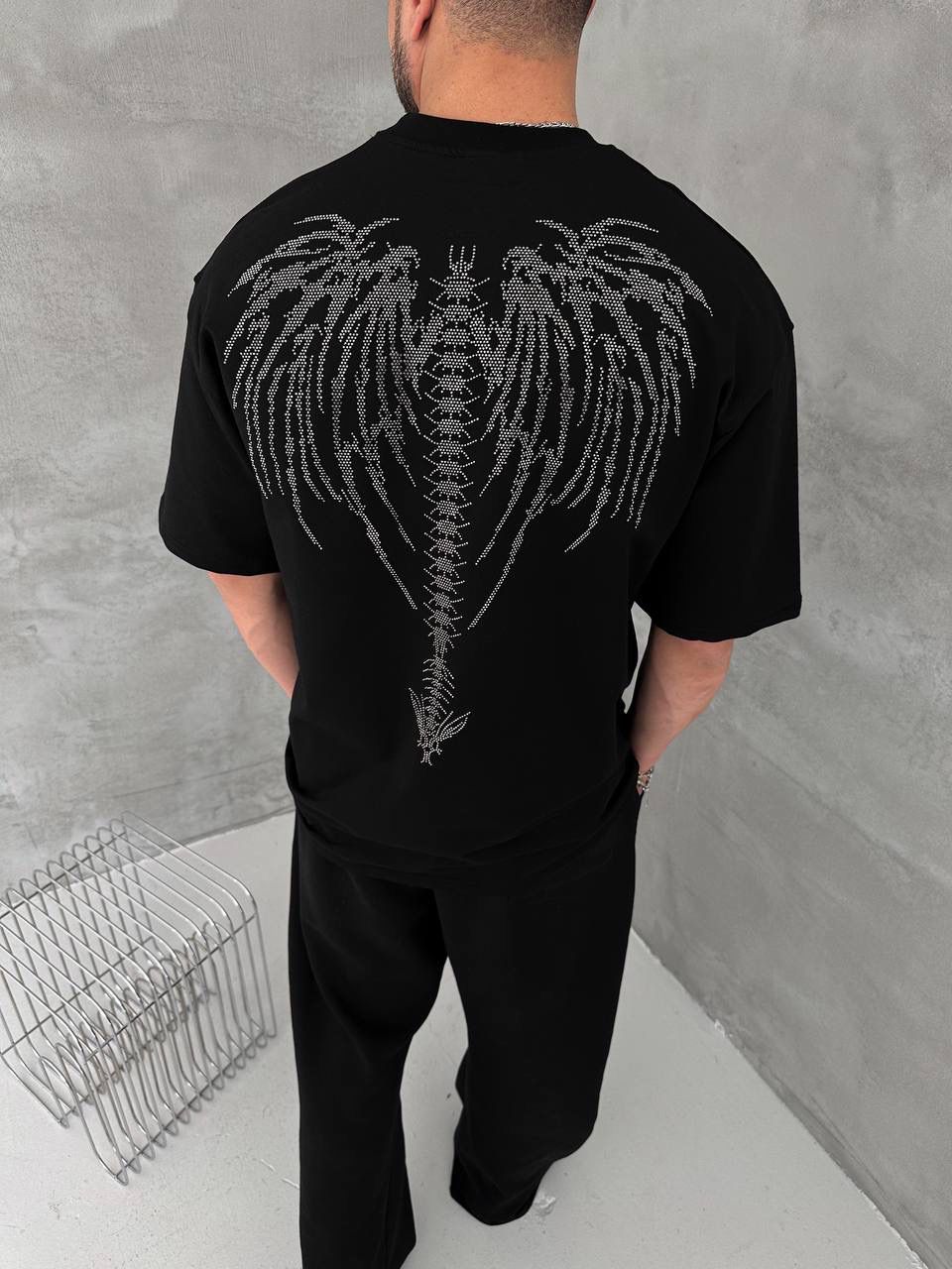 7b64b72e-1cb4-4177-8717-9576520fd1a8 | UAE SPORT STORE Men’s Black Oversized Dark Angel Rhinestone T-Shirt