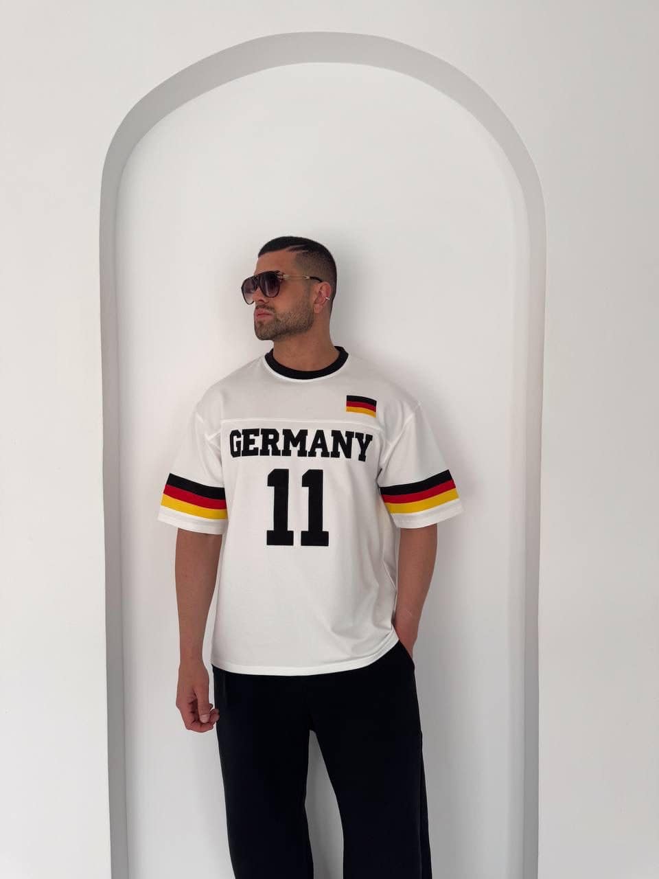 8d9cc8d5-518e-4185-aaf9-77148f3207d3 | UAE SPORT STORE Germany 11 Oversized Jersey Tee – White/Black
