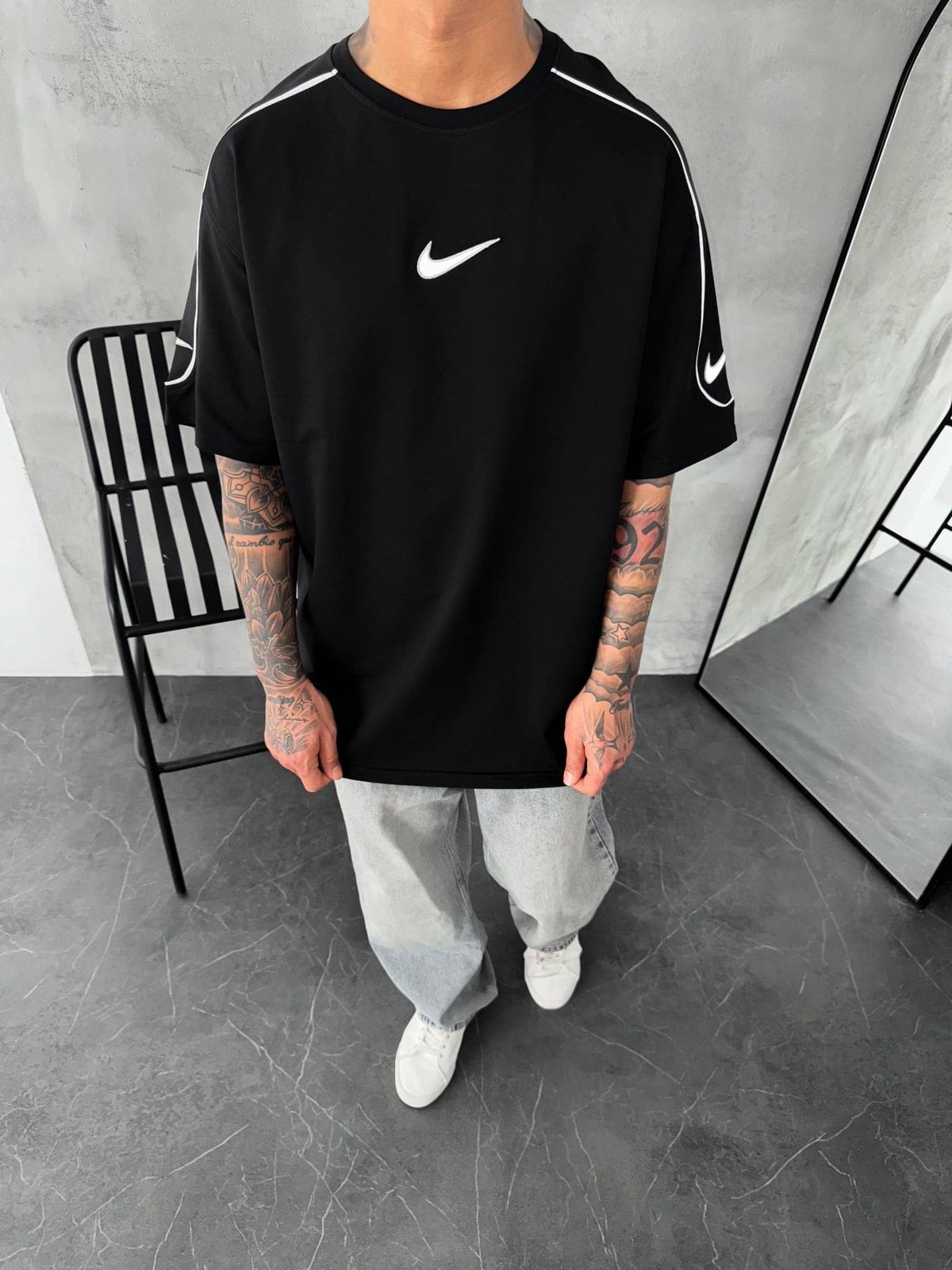 be6ab6aa-b998-4722-9482-4035990aa0c2 | UAE SPORT STORE Men’s Oversized Black T-Shirt with White Piping