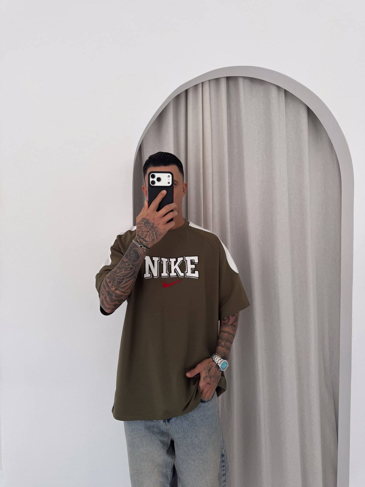 e9a6b827-cf65-4f28-8b10-2e19b0b4f9eb | UAE SPORT STORE Men’s Oversized Olive Graphic T-Shirt with White Shoulder Panels