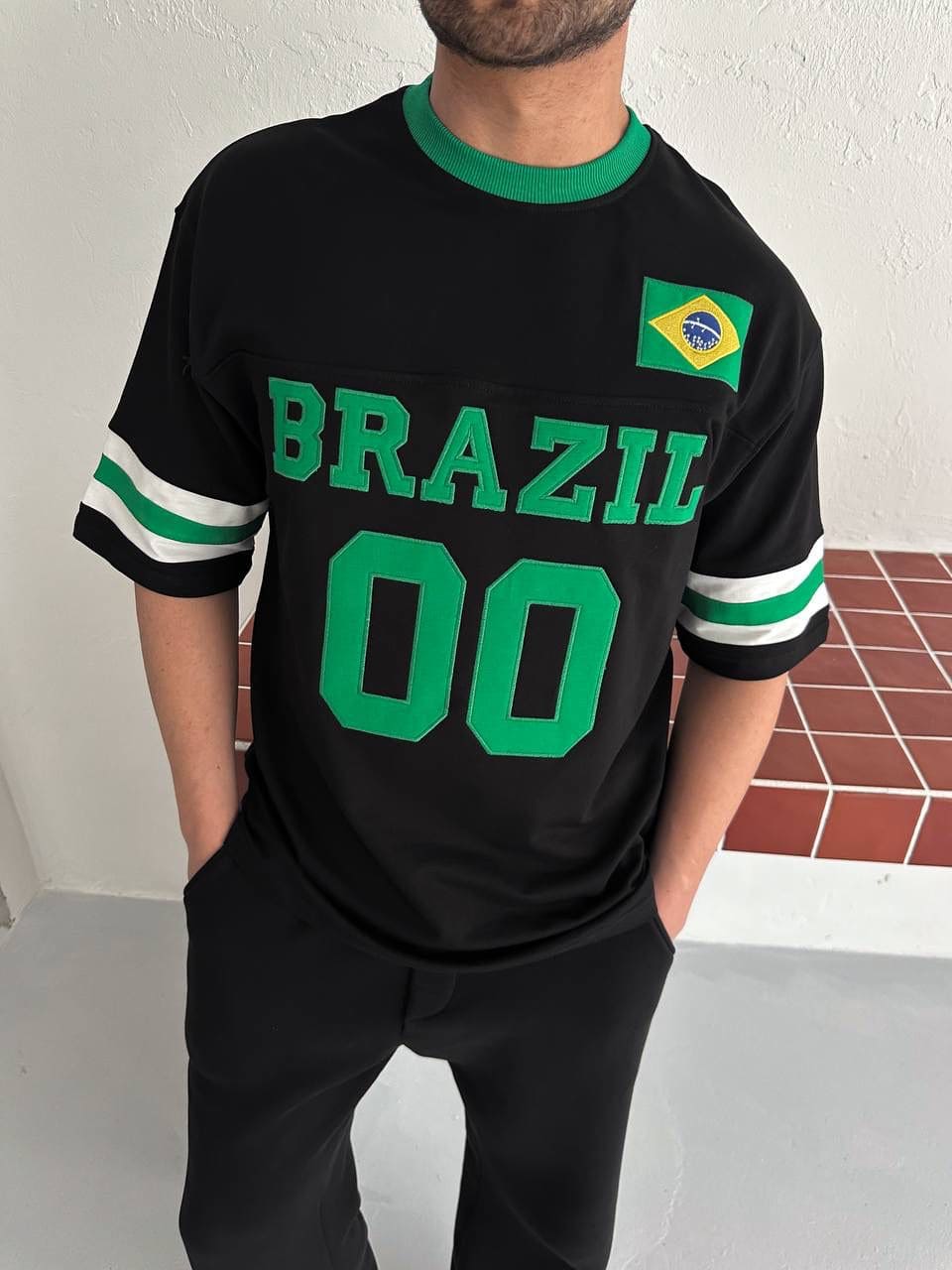 e9f08c7b-28bd-4de6-8e5e-44e9028bf4b5 | UAE SPORT STORE Brazil 00 Oversized Jersey Tee – Black/Green