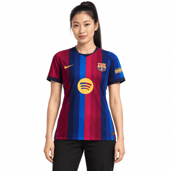 1 - UAE SPORT STORE Barcelona Women's home jersey 2026/27 with red and blue vertical stripes.