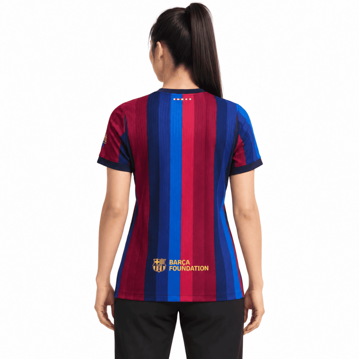 Barcelona Women Home Jersey 2026/27 with red and blue vertical stripes and 'BARCA FOUNDATION' logo.