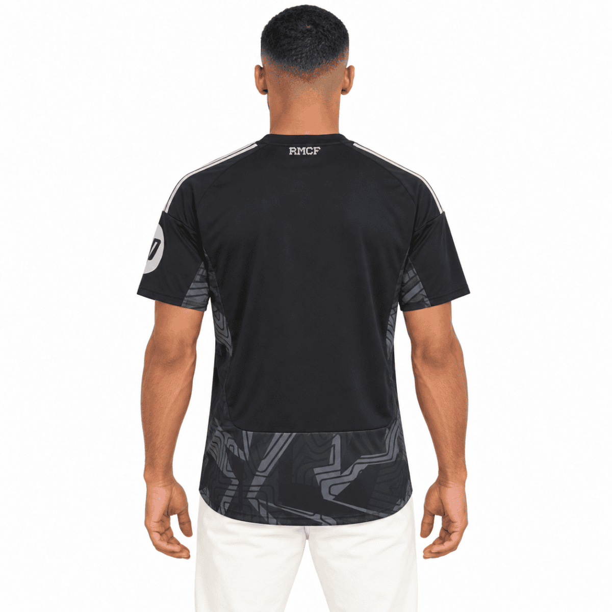 Real Madrid goalkeeper jersey 2026/27 black with white accents, back view.