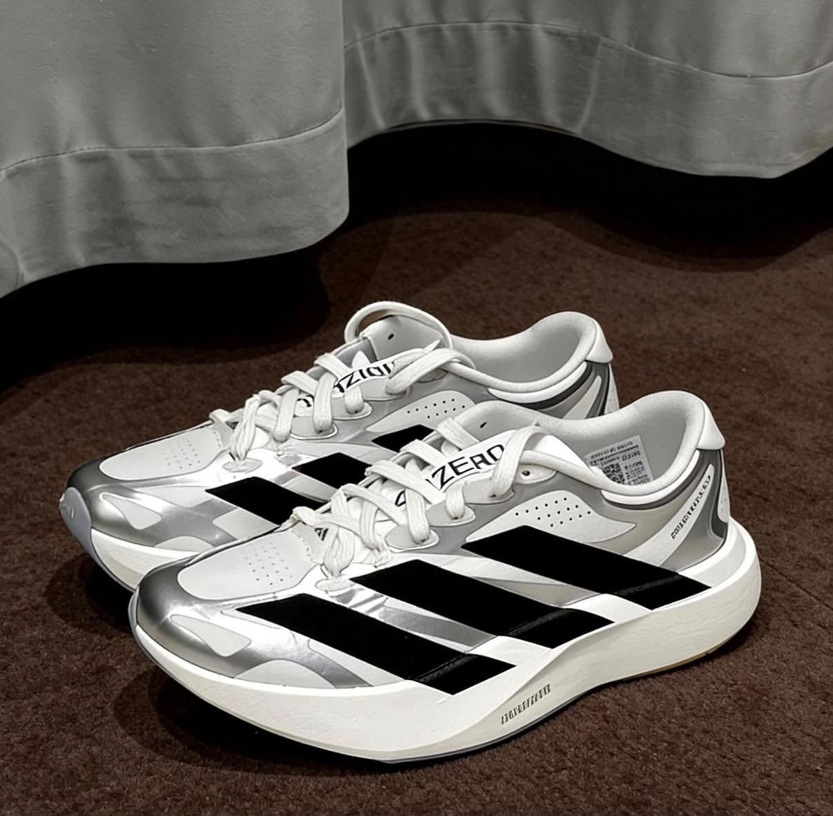 2f1f59e4-6627-4bec-9d3b-cd459289c7f9jpg | UAE SPORT STORE adidas Adizero EVO SL EXO White Black Silver