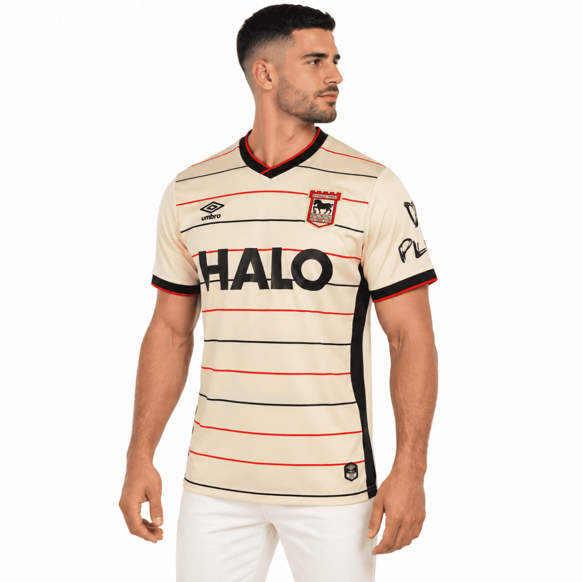 Ipswich Town away football jersey with cream color, red and black stripes, and club crest.