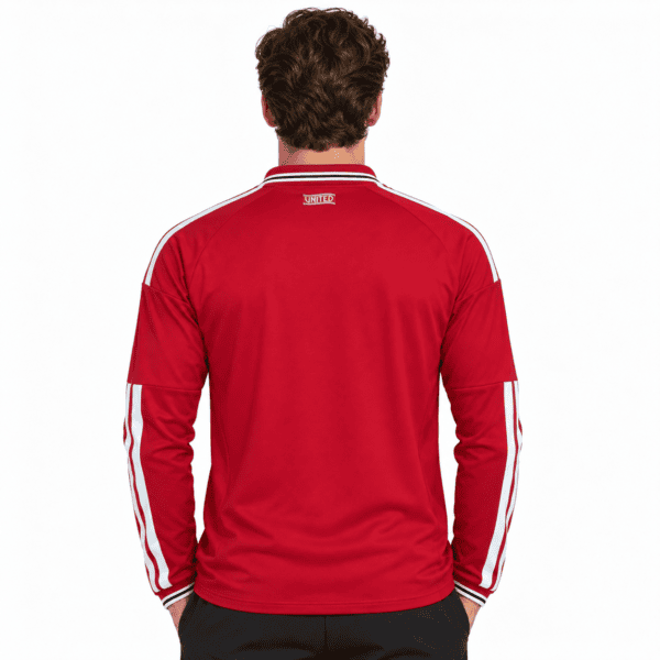 Manchester United home long sleeve jersey 2026/27 in red with white stripes.
