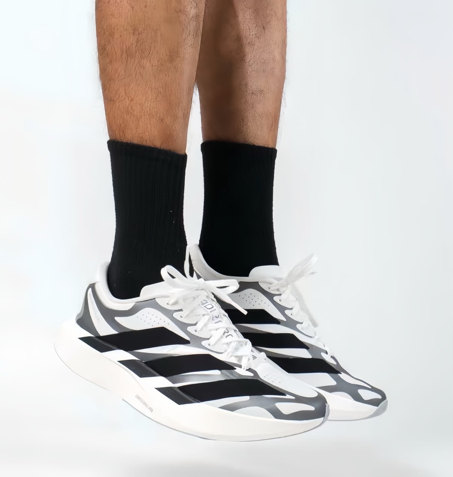 5f06c96f-b1d1-416f-b199-85539a07dcbejpg | UAE SPORT STORE adidas Adizero EVO SL EXO White Black Silver