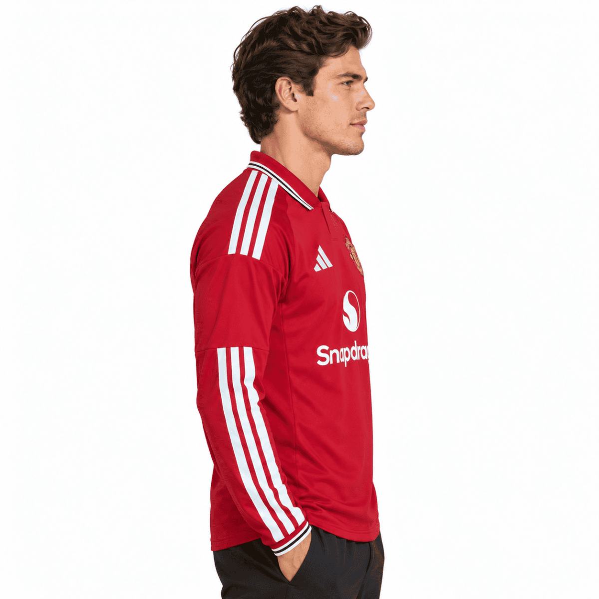 Manchester United home long sleeve jersey 2026/27 in red with white stripes.