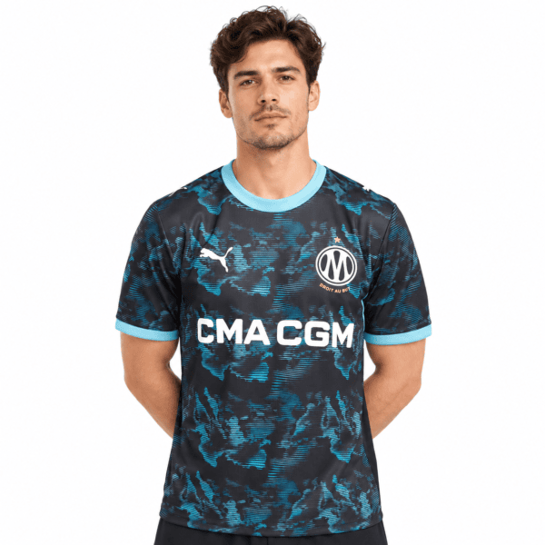 708e8ba4-3c97-4122-9571-315d76292f77 - UAE SPORT STORE Marseille away football jersey 2026/27 with blue and black camouflage design.