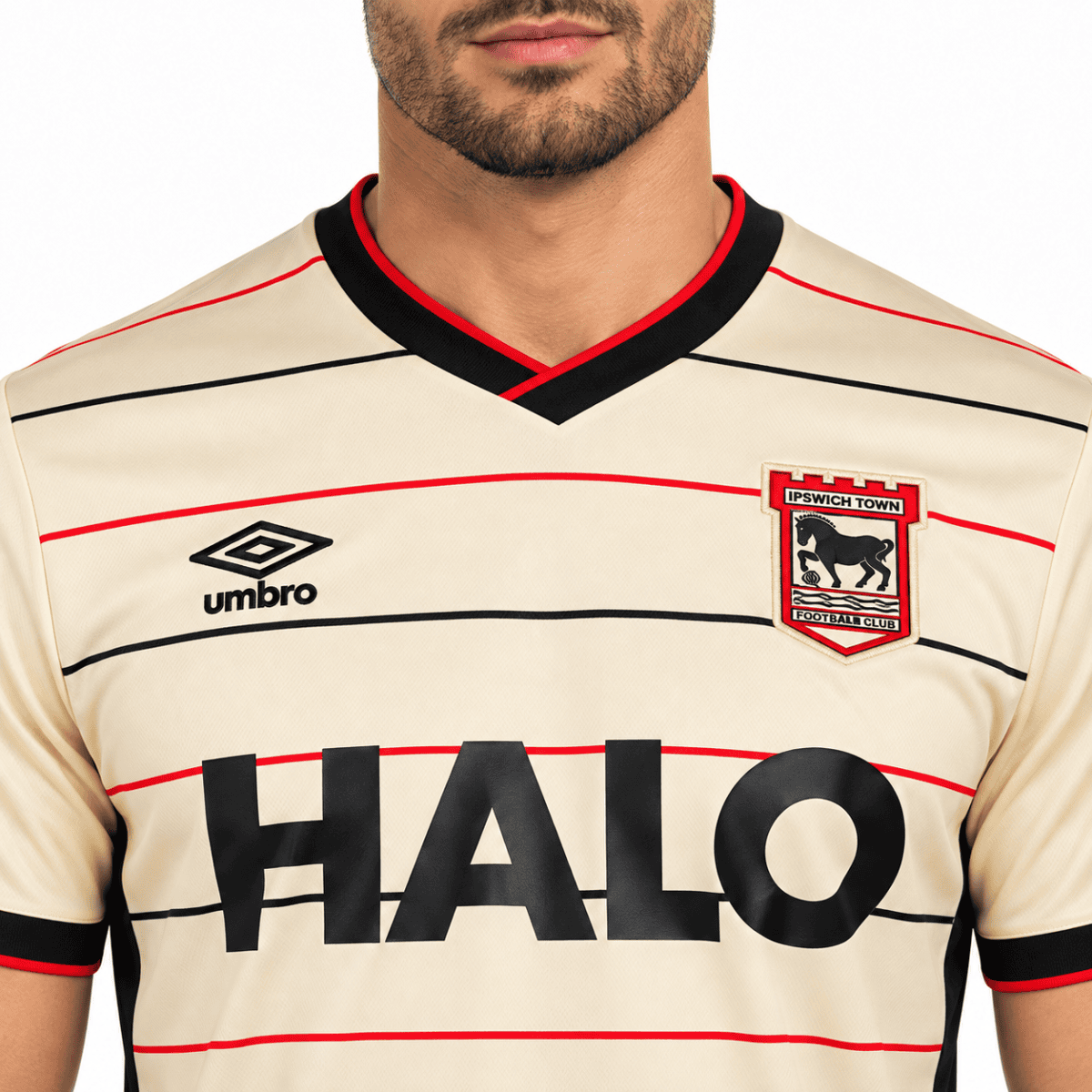 Ipswich Town away football jersey with black and red stripes, Umbro logo, and HALO sponsor.