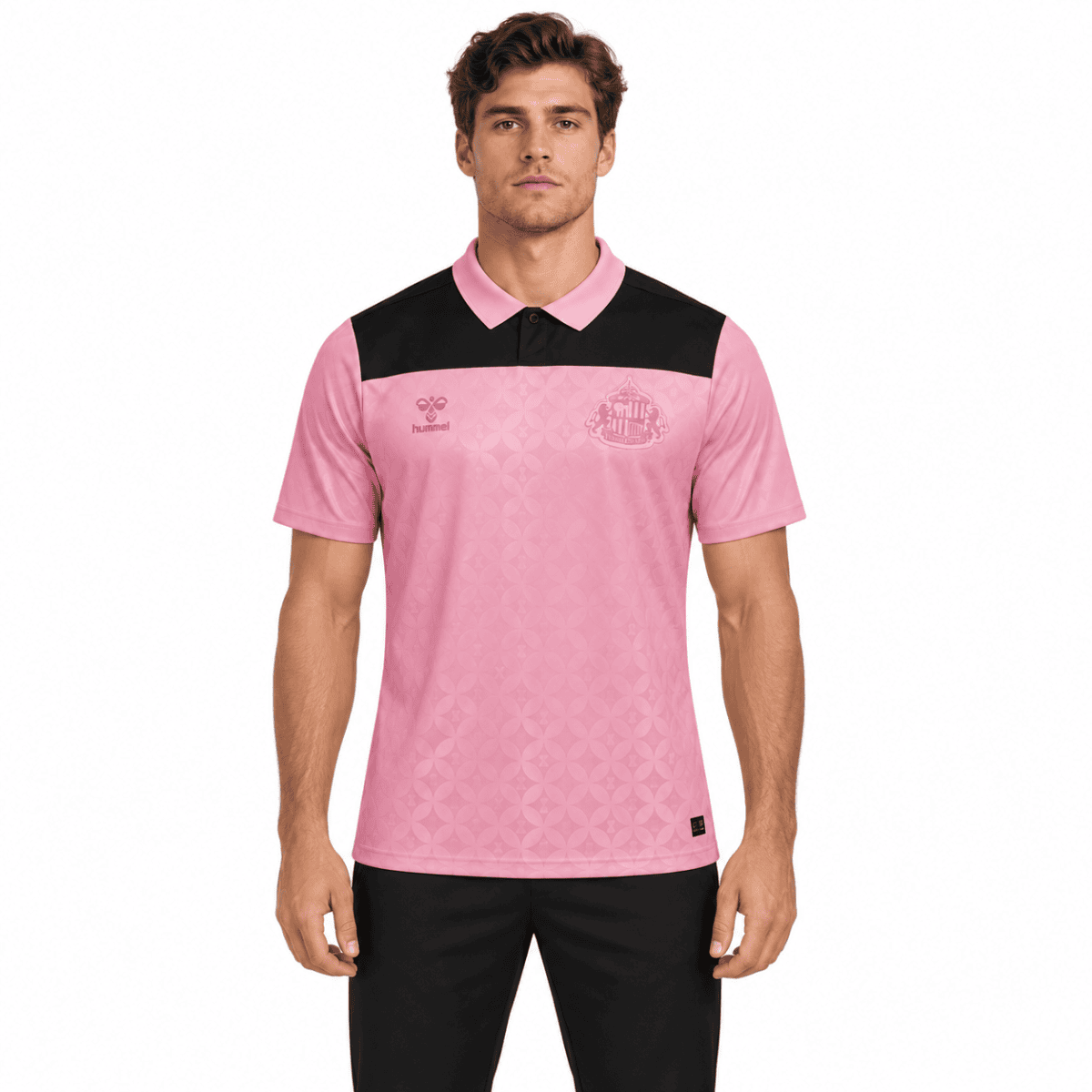 Pink Sunderland away football jersey with black shoulder panels and club crest.